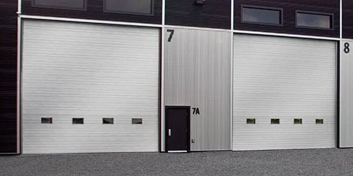 fix bent garage door in Quaker