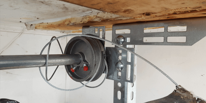 Quaker fix garage door cable